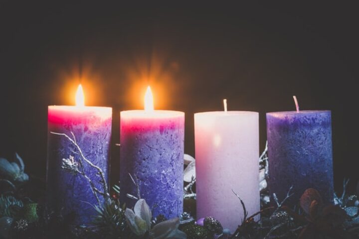 Advent candles with two of them lit