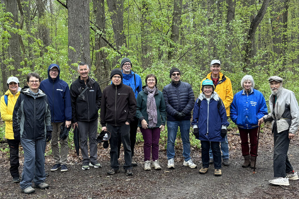 Memebers of the Mother Earth Community posing for a photo at Washington Grove